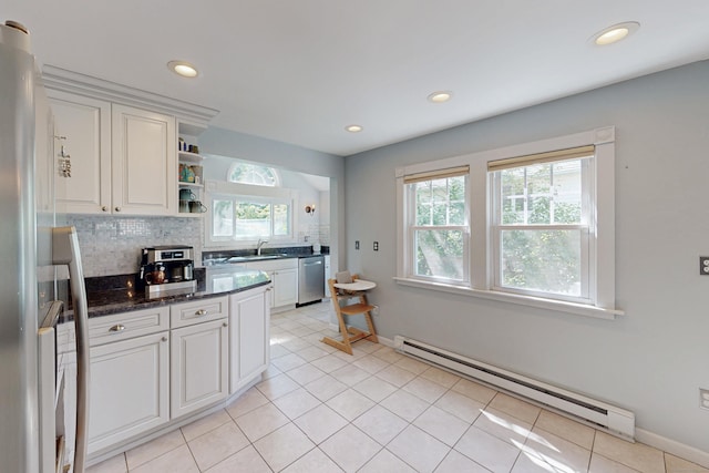 1 Yale Ave, Middlebury, CT 06762 - kitchen featuring a baseboard heating unit, dishwasher, freestanding refrigerator, tasteful backsplash, and open shelves