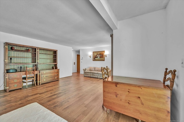 living area with wood finished floors