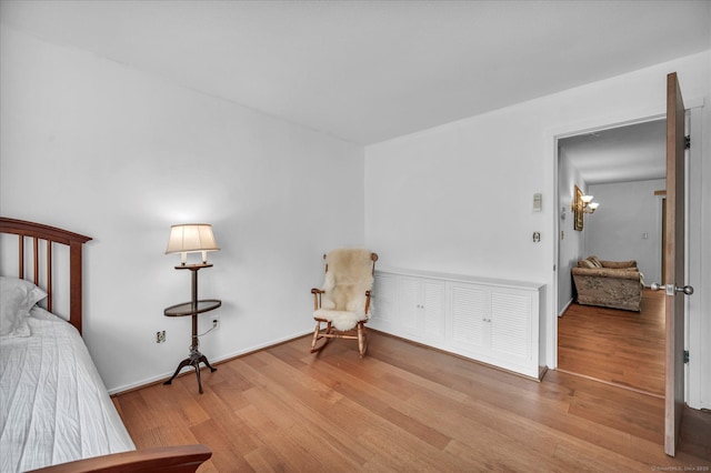 bedroom with wood finished floors