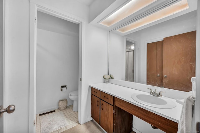 full bath with vanity and toilet