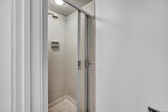 full bathroom with a stall shower