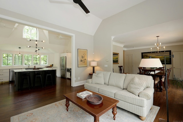 171 Cross Hwy, Redding, CT 06896 - living room with a ceiling fan, vaulted ceiling, healthy amount of natural light, dark wood-type flooring, and a chandelier