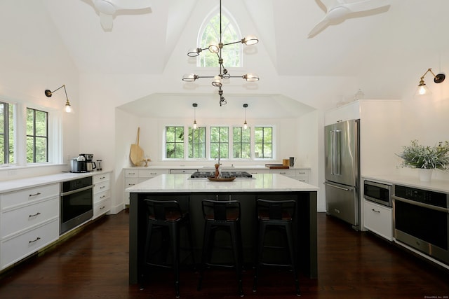 171 Cross Hwy, Redding, CT 06896 - kitchen with appliances with stainless steel finishes, a ceiling fan, white cabinets, healthy amount of natural light, and high vaulted ceiling