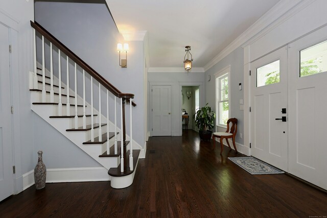 171 Cross Hwy, Redding, CT 06896 - foyer entrance featuring wood finished floors, stairs, baseboards, and crown molding