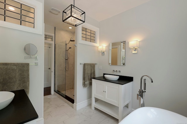 171 Cross Hwy, Redding, CT 06896 - full bathroom featuring vanity, a shower stall, marble finish floors, a freestanding tub, and a chandelier