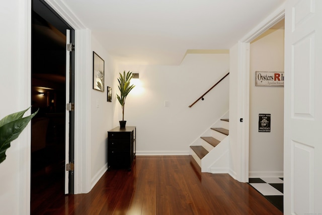 171 Cross Hwy, Redding, CT 06896 - corridor with stairway, dark wood-type flooring, and baseboards