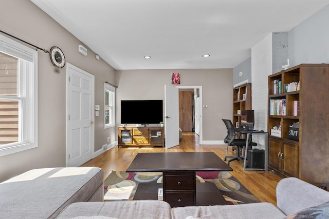 100 Boston Ter, Bridgeport, CT 06610 - living room featuring a desk, wood finished floors, baseboards, and recessed lighting