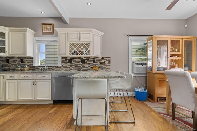 100 Boston Ter, Bridgeport, CT 06610 - kitchen with dishwasher, cooling unit, a sink, ceiling fan, and decorative backsplash