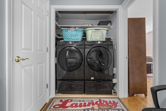 100 Boston Ter, Bridgeport, CT 06610 - laundry room with washing machine and dryer and wood finished floors