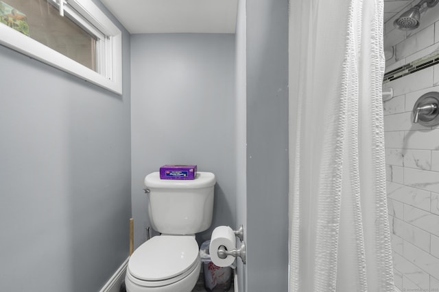 100 Boston Ter, Bridgeport, CT 06610 - full bath with a shower with curtain, toilet, and marble look tiles