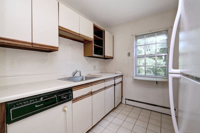 1120 New Haven Ave Apt 142, Milford, CT 06460 - kitchen with white appliances, a sink, a baseboard radiator, white cabinets, and light tile patterned flooring