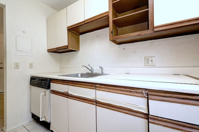 1120 New Haven Ave Apt 142, Milford, CT 06460 - kitchen with a sink, white cabinetry, light countertops, light tile patterned floors, and white dishwasher