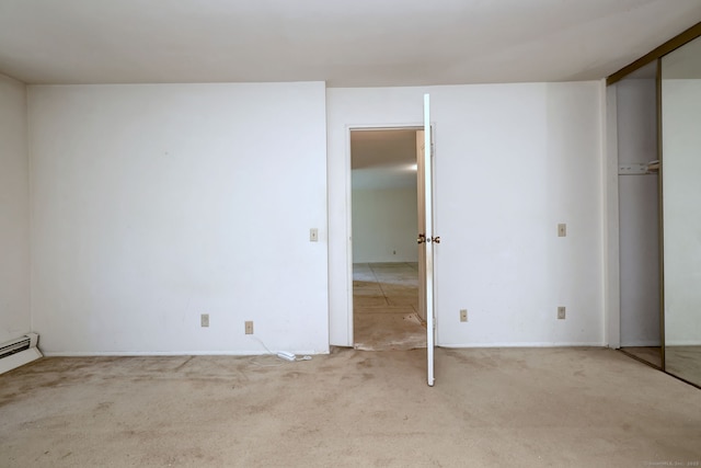1120 New Haven Ave Apt 142, Milford, CT 06460 - unfurnished bedroom featuring carpet floors and baseboard heating
