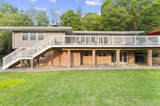 4 Wanzer Hill Rd, Sherman, CT 06784 - rear view of house featuring a wooden deck, stairway, a lawn, and brick siding
