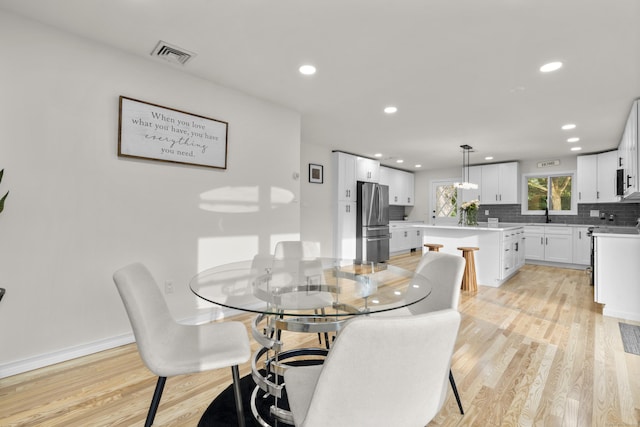4 Wanzer Hill Rd, Sherman, CT 06784 - dining area with light wood-style flooring, recessed lighting, and baseboards