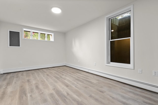 4 Wanzer Hill Rd, Sherman, CT 06784 - empty room with a baseboard radiator, wood finished floors, and baseboards