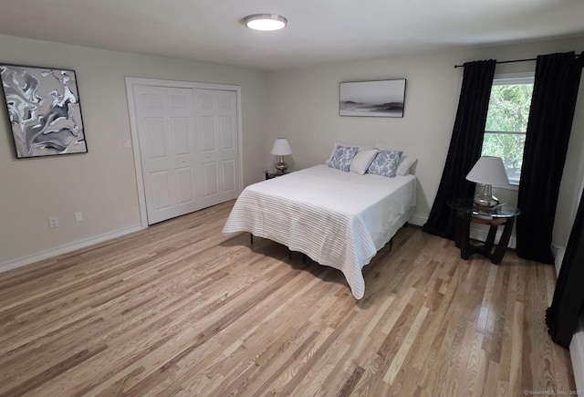 4 Wanzer Hill Rd, Sherman, CT 06784 - bedroom featuring light wood-type flooring, a closet, and baseboards