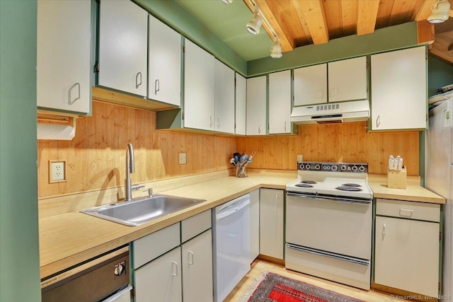 424 Trailsend Dr Unit 424, Torrington, CT 06790 - kitchen with white appliances, under cabinet range hood, a sink, light countertops, and wooden walls