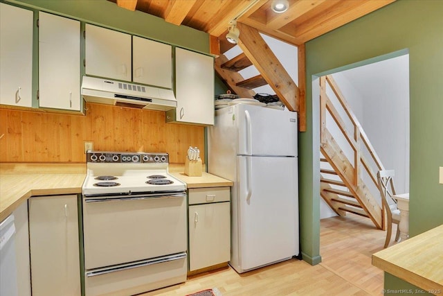 424 Trailsend Dr Unit 424, Torrington, CT 06790 - kitchen with white appliances, under cabinet range hood, light countertops, light wood-style flooring, and wooden ceiling