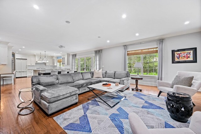 6 Coachlamp Ln, Greenwich, CT 06830 - living area with light wood finished floors, recessed lighting, and ornamental molding