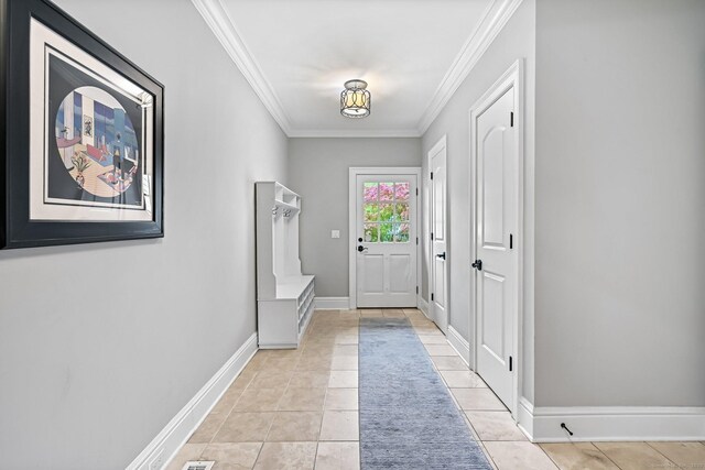 6 Coachlamp Ln, Greenwich, CT 06830 - doorway featuring crown molding, light tile patterned floors, and baseboards