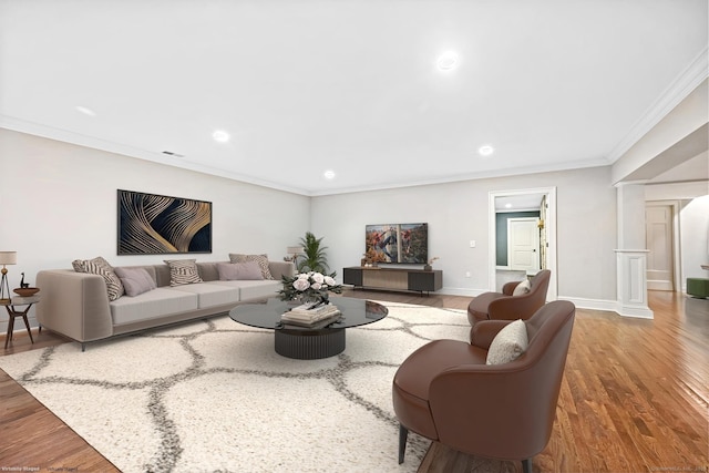 6 Coachlamp Ln, Greenwich, CT 06830 - living room featuring ornamental molding, wood finished floors, recessed lighting, baseboards, and ornate columns