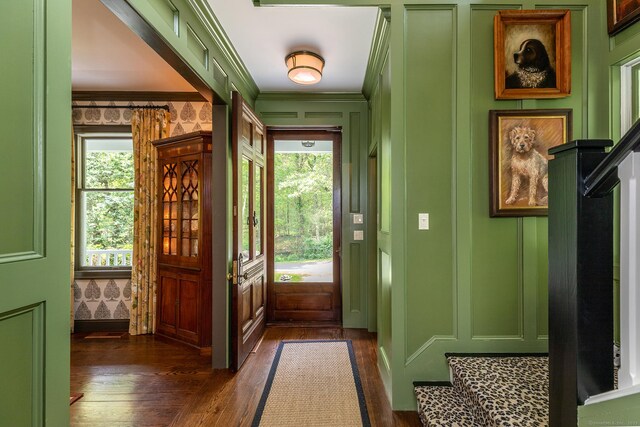 78 Garnet Rd, Roxbury, CT 06783 - entryway featuring a decorative wall, dark wood-type flooring, and crown molding