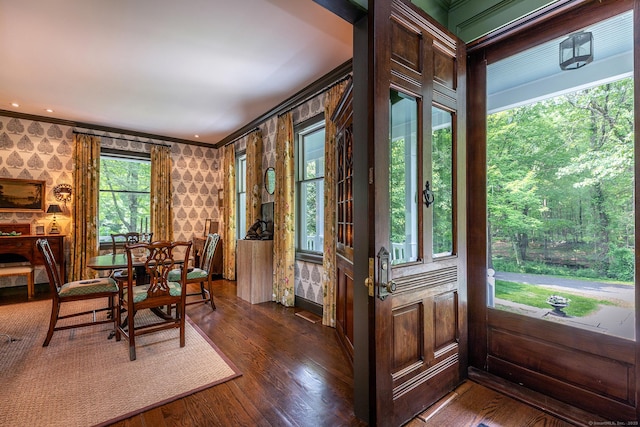 78 Garnet Rd, Roxbury, CT 06783 - dining area featuring wallpapered walls, ornamental molding, and dark wood-style flooring