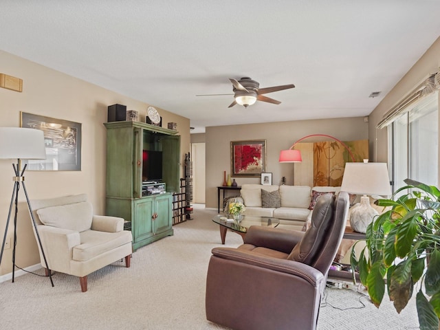 100 Wolfpit Ave Apt 19, Norwalk, CT 06851 - living room featuring light carpet, a ceiling fan, and baseboards