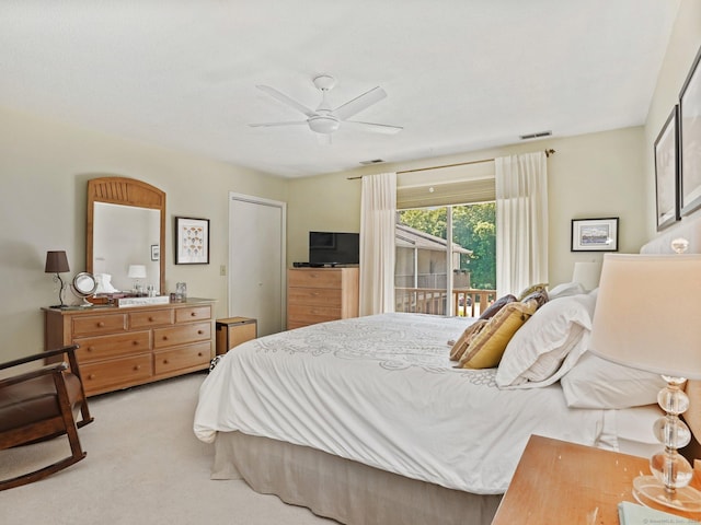 100 Wolfpit Ave Apt 19, Norwalk, CT 06851 - bedroom featuring light colored carpet, access to exterior, and a ceiling fan