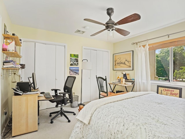 100 Wolfpit Ave Apt 19, Norwalk, CT 06851 - bedroom featuring multiple closets, a desk, carpet, and ceiling fan