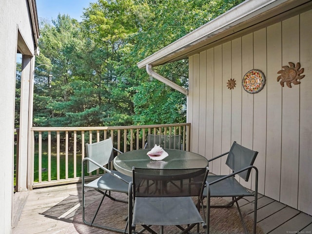 100 Wolfpit Ave Apt 19, Norwalk, CT 06851 - wooden deck with outdoor dining area