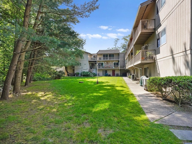 100 Wolfpit Ave Apt 19, Norwalk, CT 06851 - surrounding community featuring a lawn