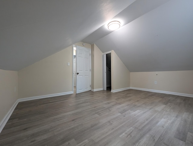 26 Westfield St, Manchester, CT 06042 - additional living space featuring wood finished floors, baseboards, and vaulted ceiling