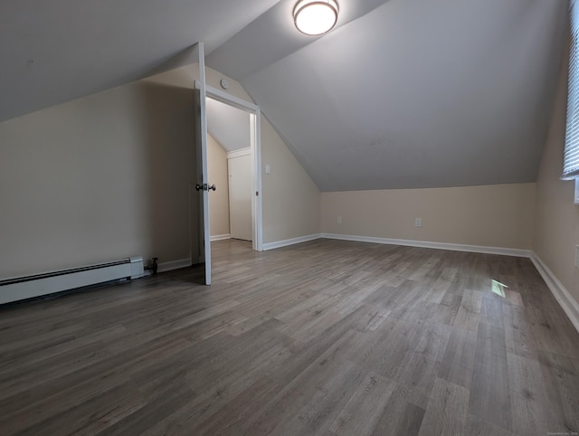 26 Westfield St, Manchester, CT 06042 - additional living space with lofted ceiling, wood finished floors, a baseboard radiator, and baseboards
