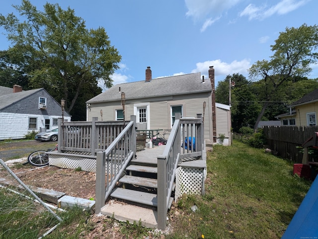 26 Westfield St, Manchester, CT 06042 - rear view of property featuring a chimney and a deck