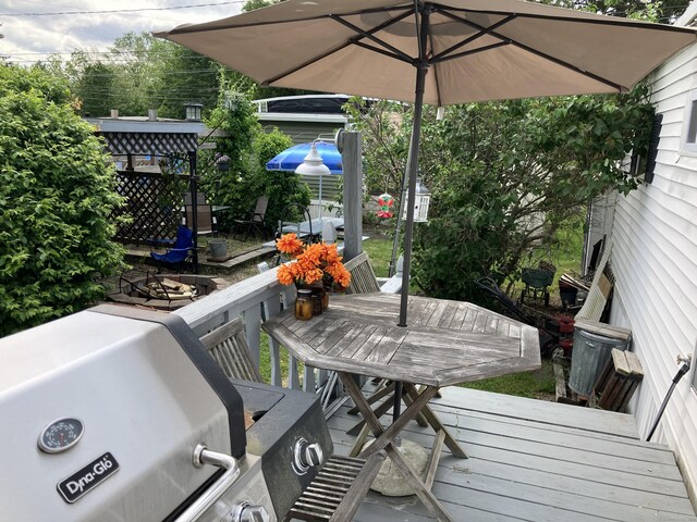 80 Sheldon Rd Lot 12, Griswold, CT 06351 - wooden deck with outdoor dining area