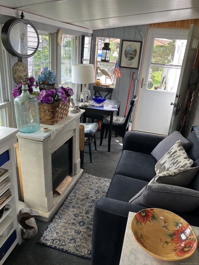 80 Sheldon Rd Lot 12, Griswold, CT 06351 - carpeted living room with healthy amount of natural light