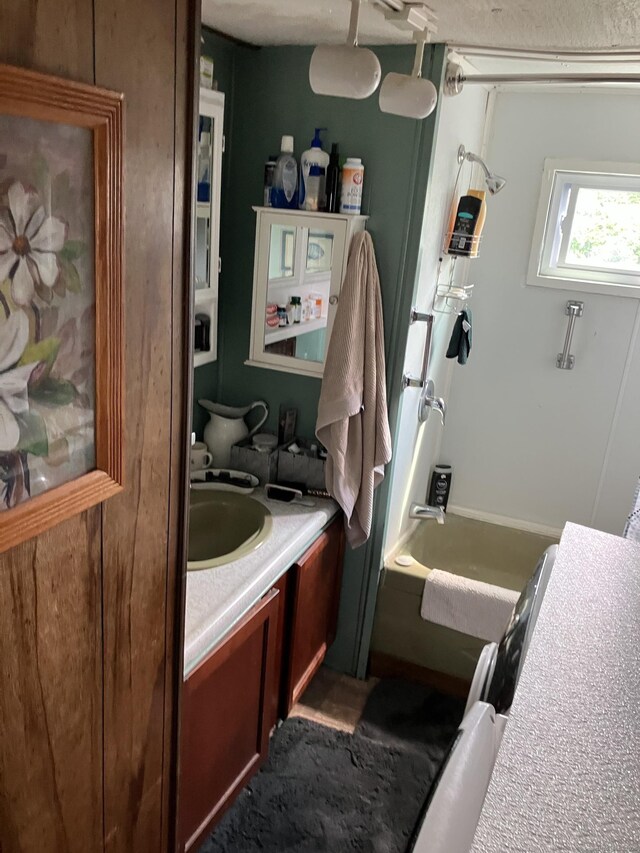 80 Sheldon Rd Lot 12, Griswold, CT 06351 - bathroom featuring vanity and washtub / shower combination