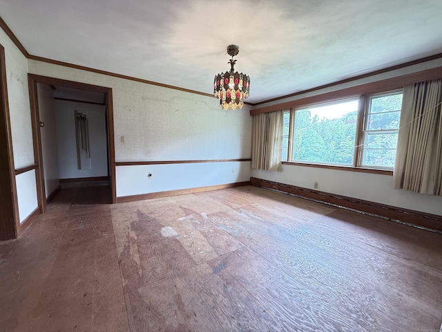 909 Randolph Rd, Middletown, CT 06457 - unfurnished room with ornamental molding, baseboards, and a chandelier