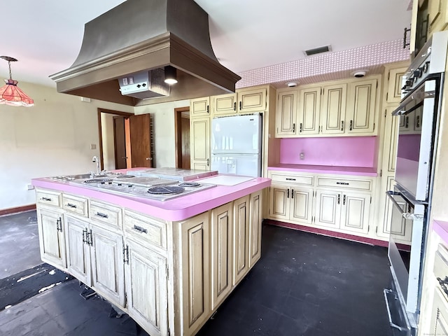 909 Randolph Rd, Middletown, CT 06457 - kitchen with white appliances, cream cabinetry, light countertops, and a kitchen island
