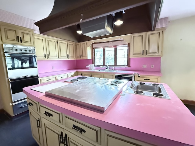 909 Randolph Rd, Middletown, CT 06457 - kitchen with white double oven, a sink, light countertops, and cream cabinets