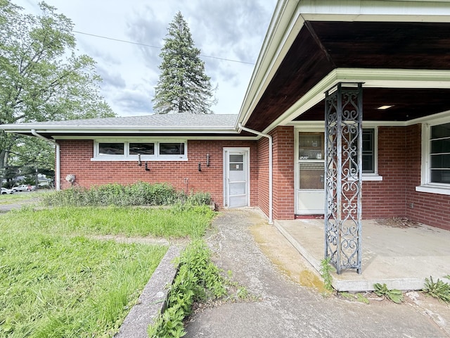 909 Randolph Rd, Middletown, CT 06457 - view of front of home with brick siding