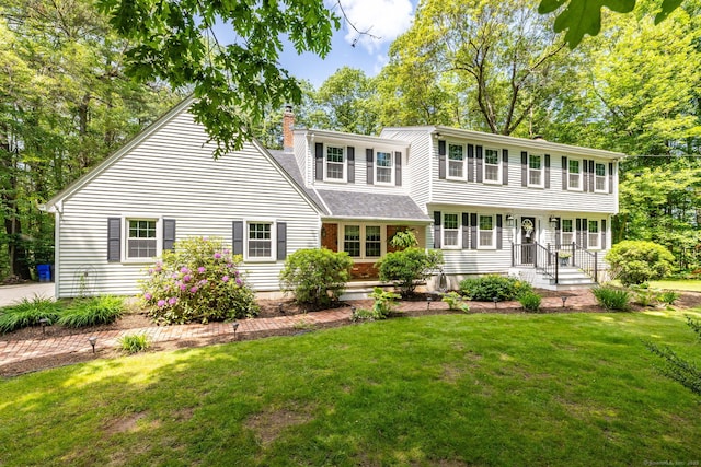 825 Copper Hill Rd, Suffield, CT 06093 - view of front facade with a chimney and a front yard