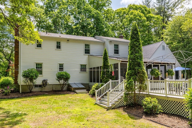 825 Copper Hill Rd, Suffield, CT 06093 - back of property featuring a sunroom, a chimney, and a yard