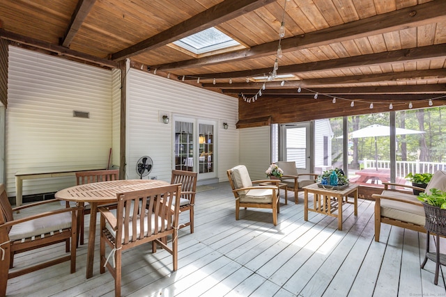 825 Copper Hill Rd, Suffield, CT 06093 - sunroom with a skylight, outdoor lounge area, outdoor dining area, and beam ceiling