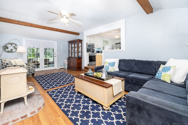 825 Copper Hill Rd, Suffield, CT 06093 - living area with a ceiling fan, wood finished floors, and a baseboard heating unit