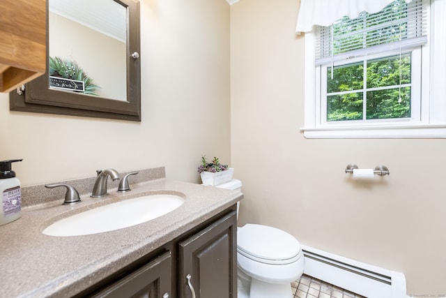 825 Copper Hill Rd, Suffield, CT 06093 - half bathroom with a baseboard radiator, toilet, and vanity