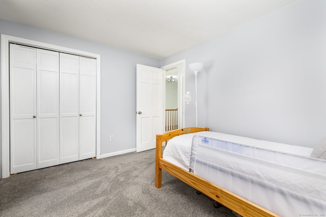 825 Copper Hill Rd, Suffield, CT 06093 - bedroom with carpet floors, baseboards, and a closet