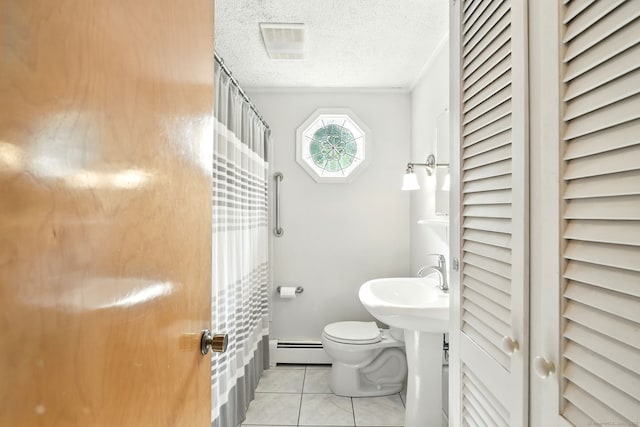 3 Birchwood Ter, Enfield, CT 06082 - bathroom featuring baseboard heating, a textured ceiling, toilet, tile patterned floors, and curtained shower